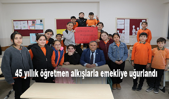45 yıllık öğretmen alkışlarla emekliye uğurlandı